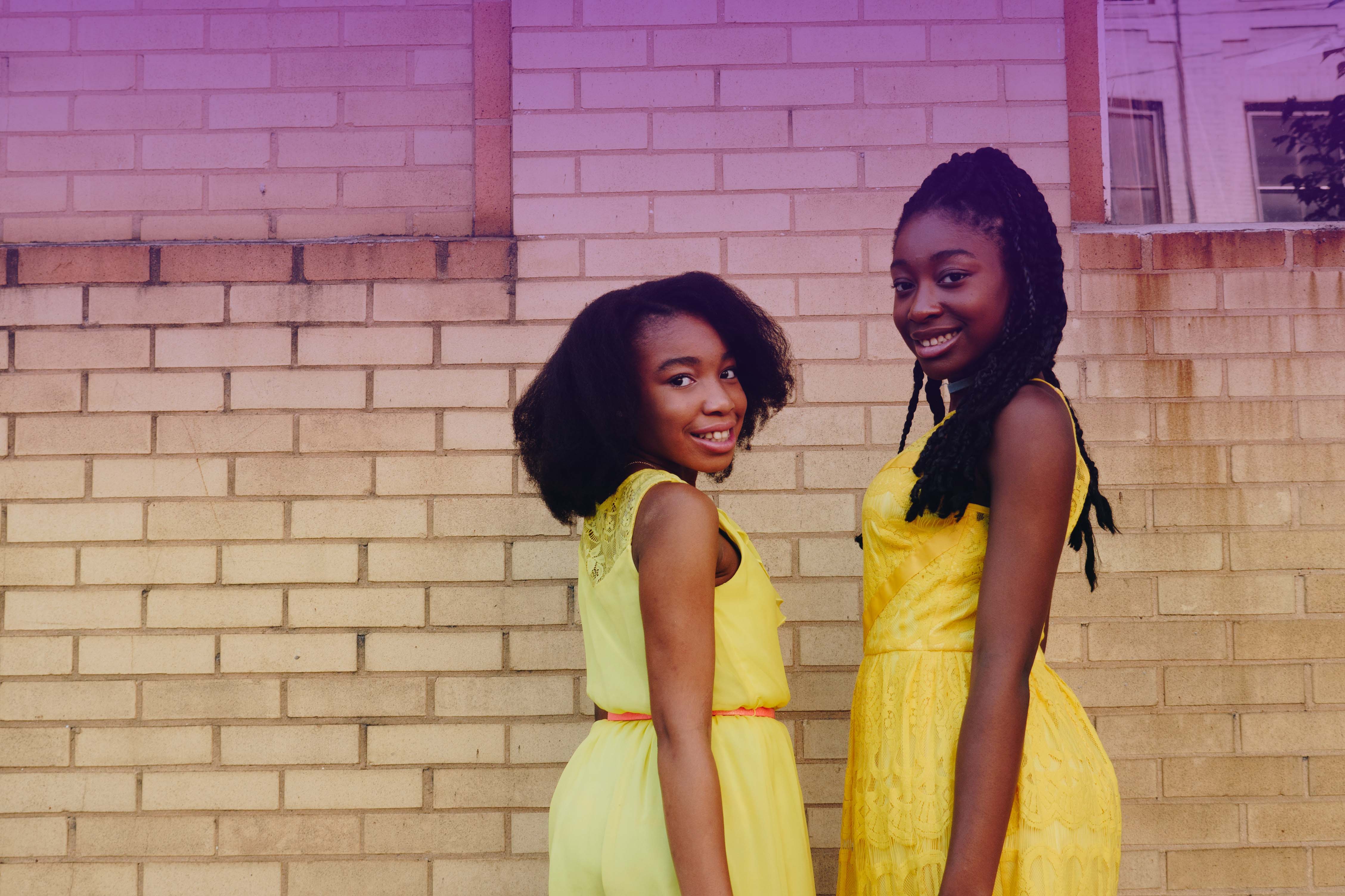 girls in yellow with purple